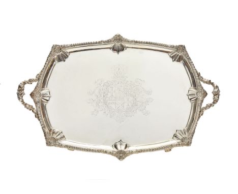  A George III silver shaped oblong twin handled tray by William Bennett,   London 1808, with a cast gadrooned rim with shells