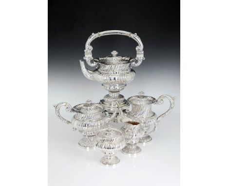 Ω An Italian silver five piece wrythen moulded and ogee baluster tea and coffee service by Luigi Genazzi, Milan, pre 1934 .80