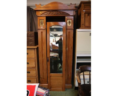 Edwardian Satinwood Single wardrobe with mirrored door inset metal panels and shaped pediment 