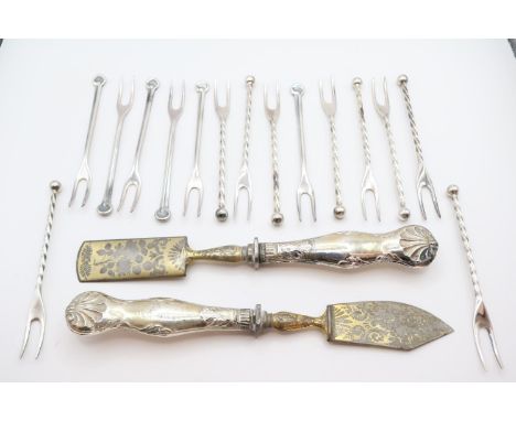 White metal handled Niello decorated servers and a collection of Silver plated Pickle forks 