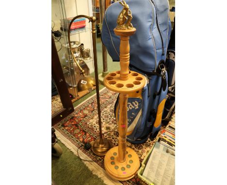 Turned Wooden revolving stick stand with surmounted Rabbit decoration and a Standard Lamp 