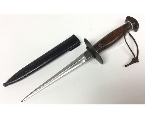 WW1 Belgian Trench Knife, converted from an M1889 bayonet. Single edged 20cm long blade. Proof mark to blade. Oval steel guar