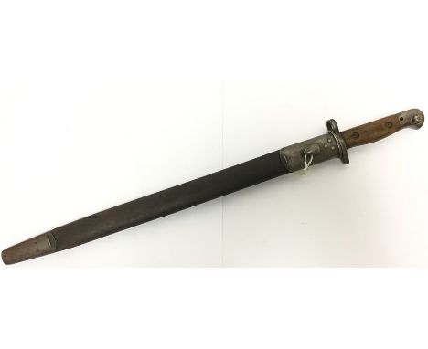 WW1 British 1907 pattern bayonet with single edged fullered 43cm long blade maker marked Sanderson. Overall length 52cm. Comp