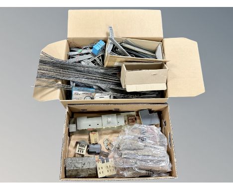 Two boxes of N scale railway track, Kato power pack, model railway building accessories etc 