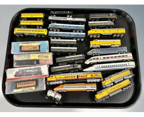 A group of mainly unboxed N scale die cast locomotives and rolling stock including Bachmann, Roundhouse etc 