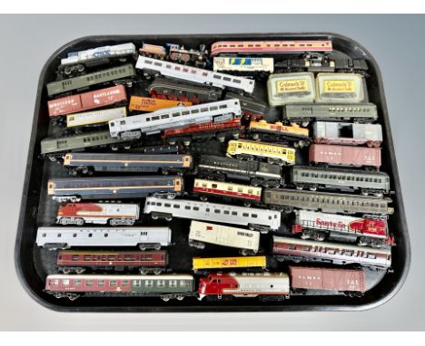 A group of N scale die cast locomotives and rolling stock including Bachmann, Kato etc 