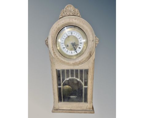 An oak eight day wall clock 