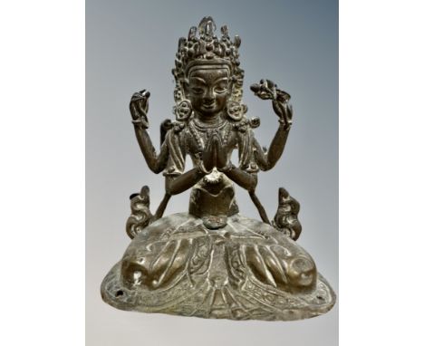 A 19th century Indo-Tibetan bronze devotional figure, height 11cm. 