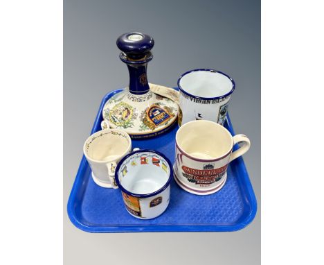 A ceramic Pusser's rum decanter (empty), together with a Sunderland Draught bitter lustre mug, Wade pottery cider mug and two