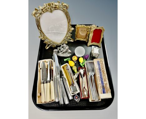 Three brass Art Nouveau style photograph frames, quantity of stainless steel flatware, pewter ornament etc 