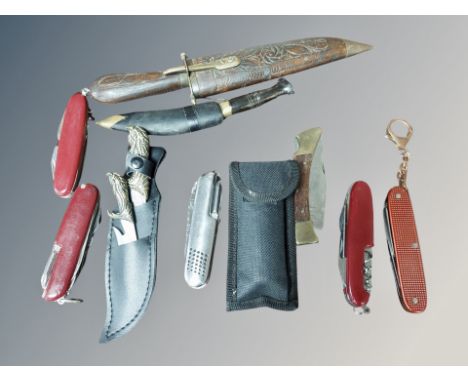A miniature kukri knife and other knives to include Swiss Army knife, pen knife etc 