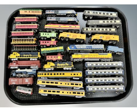 A group of N scale die cast locomotives and rolling stock including Con-cor, Kato etc 