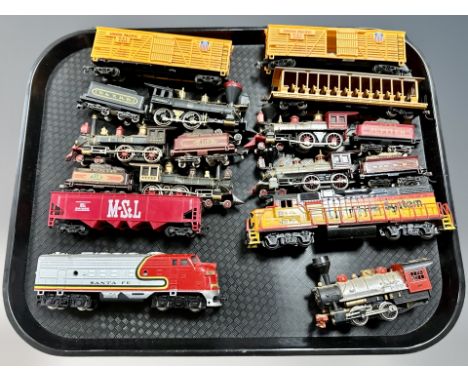 A group of HO scale die cast locomotives and rolling stock including Bachmann, Life-like etc 