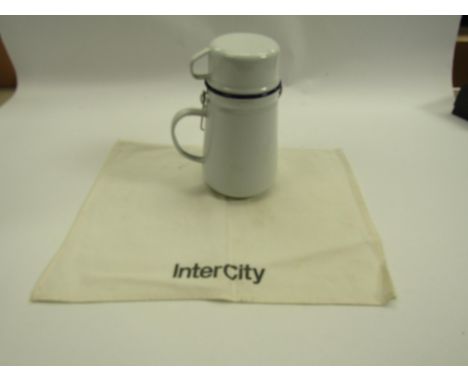 An engineman's enamel billy can and Intercity head cloth 