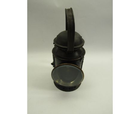 A B.R (W) three aspect hand lamp with ceramic and brass burner, reservoir and reflector