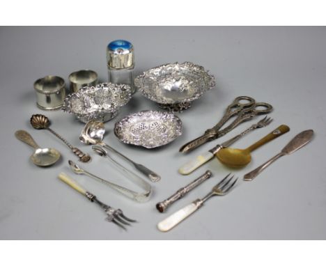 A selection of silver to include three pierced bon bon dishes to include a Victorian Nathan & Hayes example, Birmingham 1892,