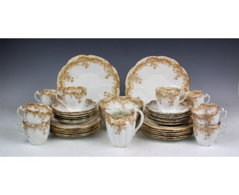 A Victorian Wileman & Co part tea service, Rd No.276279, decorated in Fern print pattern No.5899, comprising; twelve teacups 