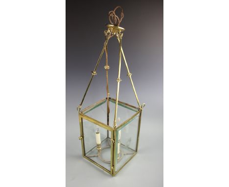 A gilt brass square section hall lanterns, three light with cut glass panes, 70cm  CONDITION REPORT: Lighting lots are sold a