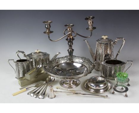 A late Victorian silver plated four piece tea service, each of quatrefoil form and bright cut with floral sprays and garlands