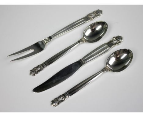 A pair of Georg Jensen acorn pattern silver teaspoons, and a matching silver child's knife and two pronged fork, stamped mark