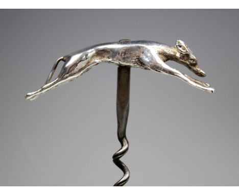 A George V silver corkscrew, modelled as a racing greyhound, William Hutton and Sons, Sheffield 1931, 10cm long  