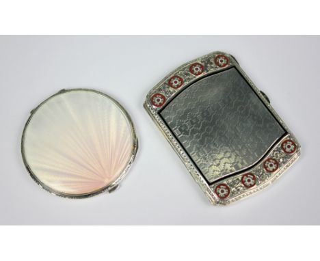 An Art Deco silver and graduated pink guilloche enamel circular compact, Mappin and Webb, London 1938, 6.3cm diameter along w