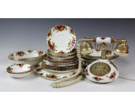 A collection of Royal Albert old country roses to include a  telephone, three large salad bowls, 24cm diameter, two oval serv