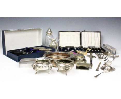 A collection of silver and plated wares, to include; two cased sets of silver teaspoons, a silver sugar shovel, a letter open