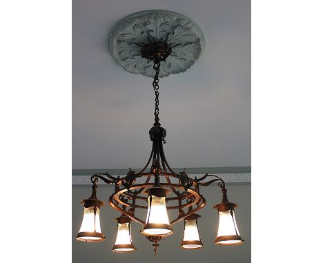 An Arts and Crafts copper ceiling light / chandelier possibly Birmingham Guild of Handicraft, with flower head top, the elabo