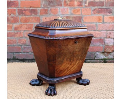 A Regency mahogany wine cooler / cellarette , of sarcophagus form, with gadrooned lid, on carved paw feet, 60cm H x 50cm W x 