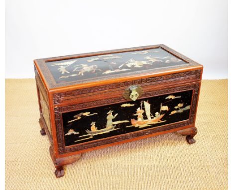 A late 19th century Chinese carved camphor wood blanket box / trunk, inlaid on the lid and three sides in soapstone and hard 
