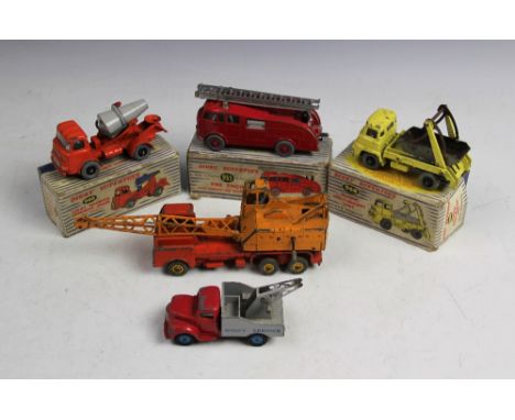 Four Dinky Supertoys model vehicles comprising; Marrel Multi-Bucket unit 966, Lorry Mounted Concrete Mixer 960 and Fire Engin