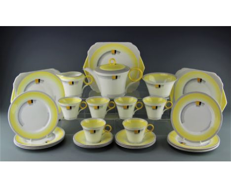 An Art Deco Shelley tea service, Reg No.781613, comprising; six teacups and saucers saucers, eight plates, three serving plat