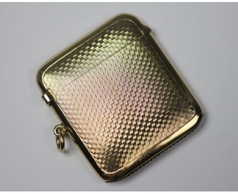 A George V 9ct gold Sampson Mordan & Co vesta case, London 1918, engine turned detailing, with hinged cap and suspension loop