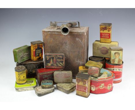 A vintage Shell petrol can, with cap and nozzle, with a selection of vintage biscuit tins and four ceramic and tin warming pl