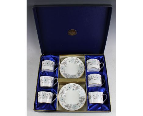 A Coalport 'My Fair Lady' coffee service, comprising six cups and six saucers, boxed (12)
