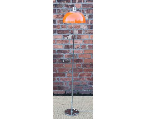 Harvey Guzzini - A 1960's orange perspex and chrome standard lamp, the height adjustable domed shade with twin bulb fitting, 