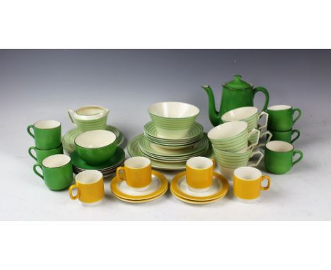 An Art Deco green pinstripe decorated tea service comprising; four teacups and saucers, four plates, a milk jug and saucer, a