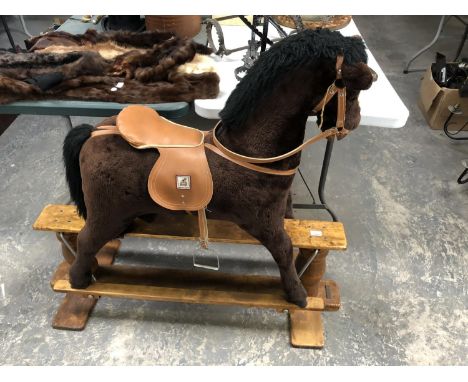 A MODERN 'MAMAS AND PAPAS' SOFT TOY CHILDREN'S ROCKING HORSE MODEL ON WOODEN BASE 