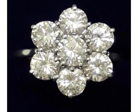 A LADIES  18 CT WHITE GOLD DIAMOND CLUSTER RING WITH CENTRAL STONE APPROX 0.5CT AND SURROUNDING SIX STONES APPROX 0.44 EACH, 