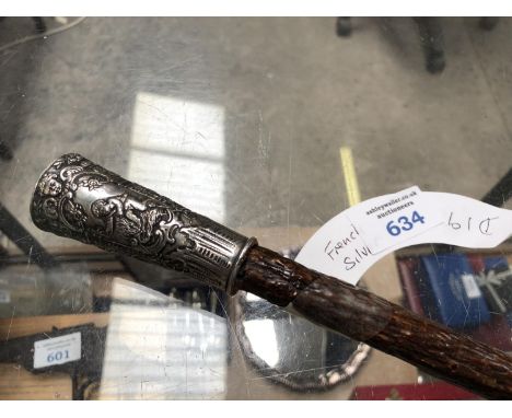 A WOODEN WALKING STICK / CANE WITH POSSIBLY 19TH CENTURY FRENCH WHITE METAL FERRULE TOP 