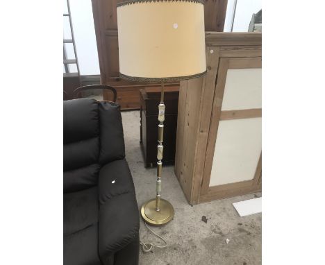 AN ONYX AND BRASS STANDARD LAMP 