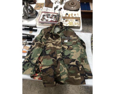 A UNITED STATES ARMY CAMO JACKET 