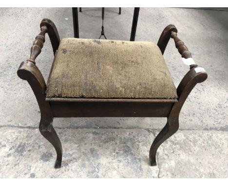 A VINTAGE MAHOGANY LIDDED SEWING STOOL 