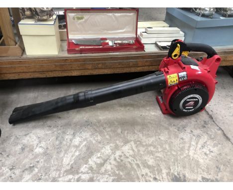 A HONDA 'HHB25' FOUR STROKE ENGINE EASY START LEAF BLOWER, AS NEW, WORKING ORDER, RETAIL £400+ 