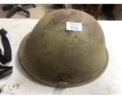 A VINTAGE ARMY METAL HELMET 