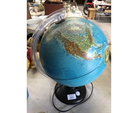 A MODERN LIGHT UP GLOBE, WORKING 