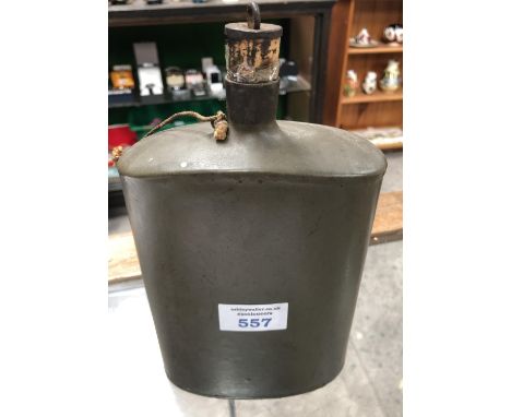 A W.W.II ENAMEL WATER BOTTLE WITH ORIGINAL CORK 