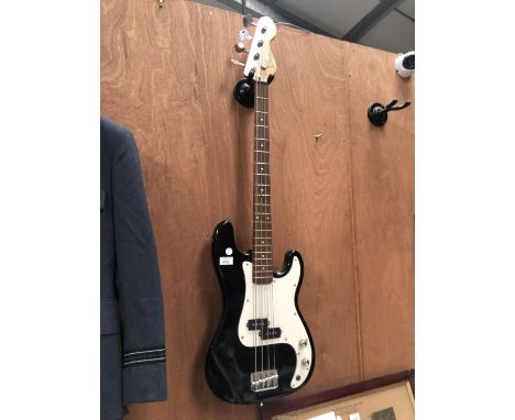 AN ENCORE BLACK BASS GUITAR 