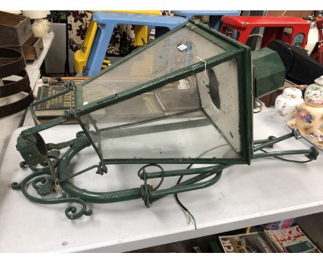 A LARGE VINTAGE GREEN PAINTED GARDEN HANGING LANTERN WITH METAL STAND 